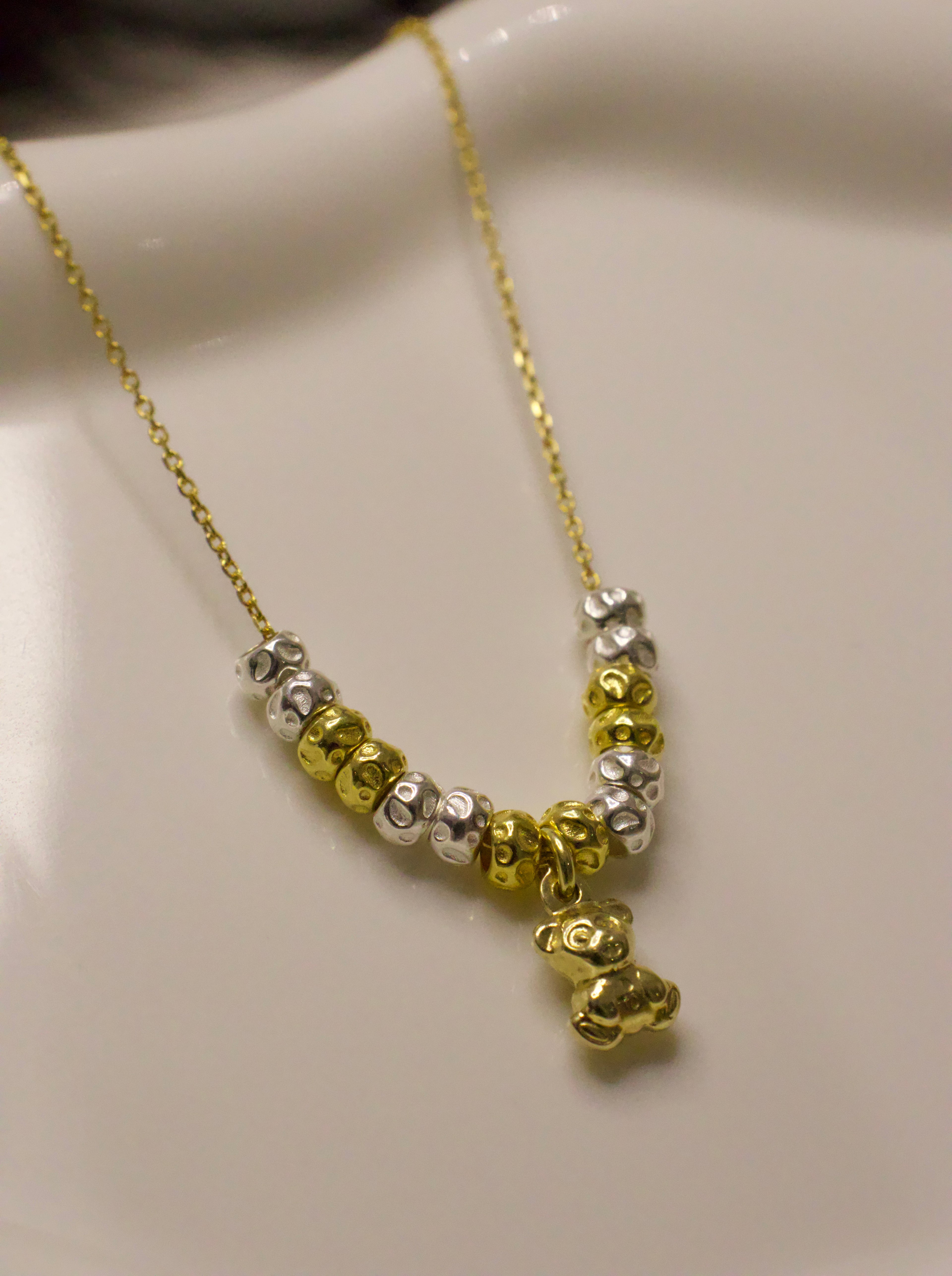 Collana Granelli Bombati Argento e Oro e Charms