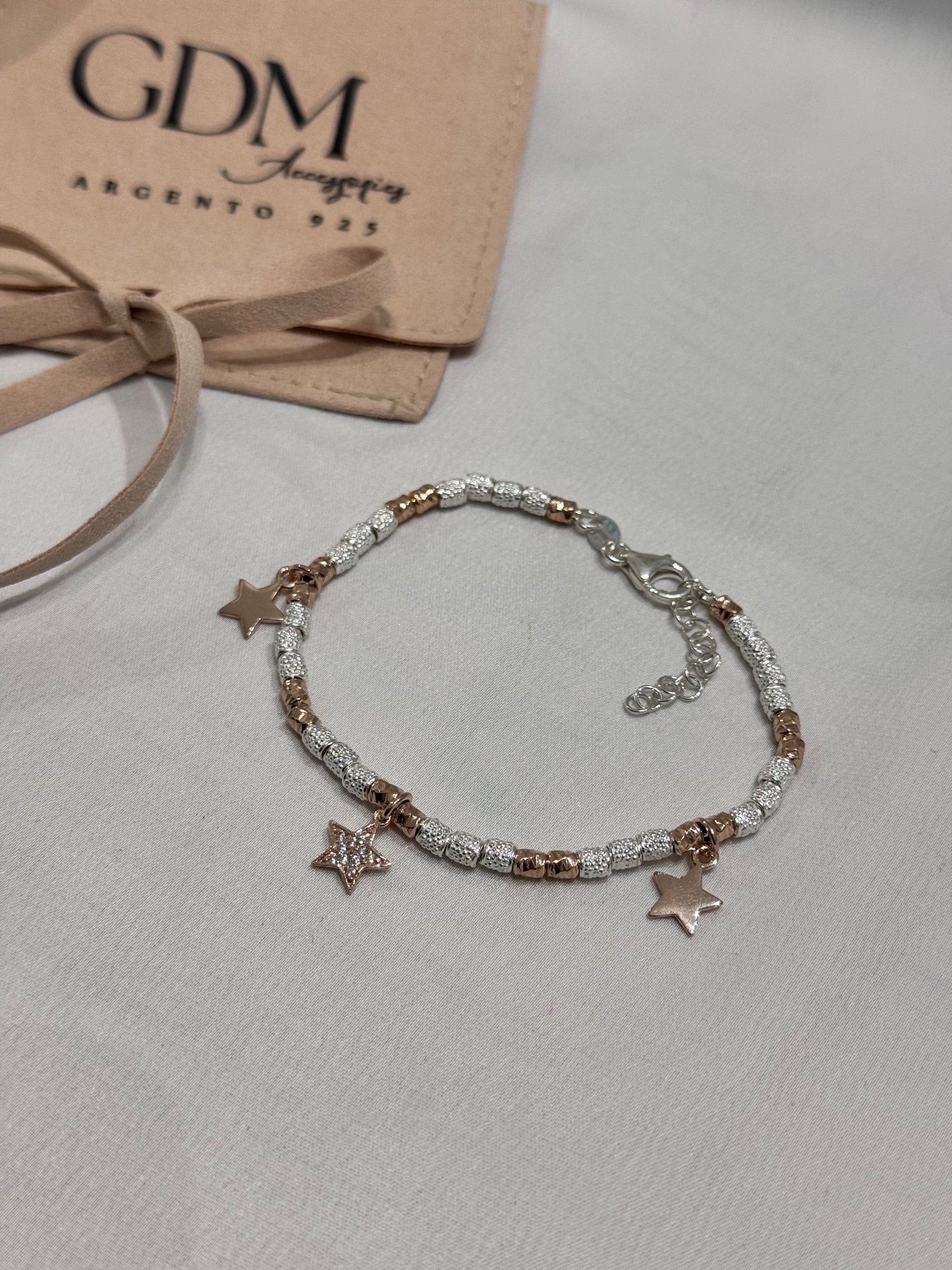 Bracciale granelli e charms