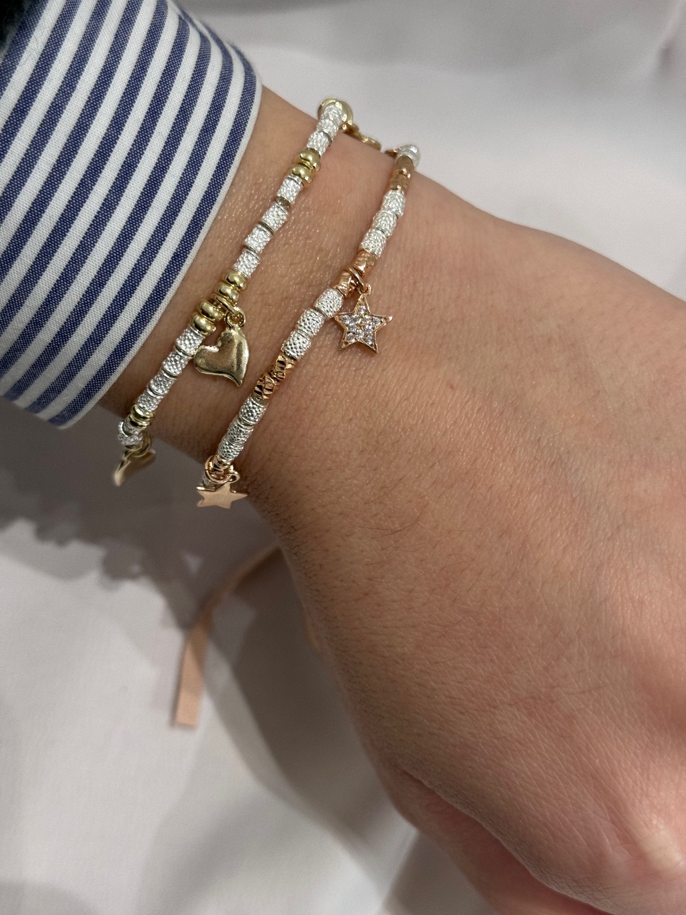 Bracciale granelli e charms