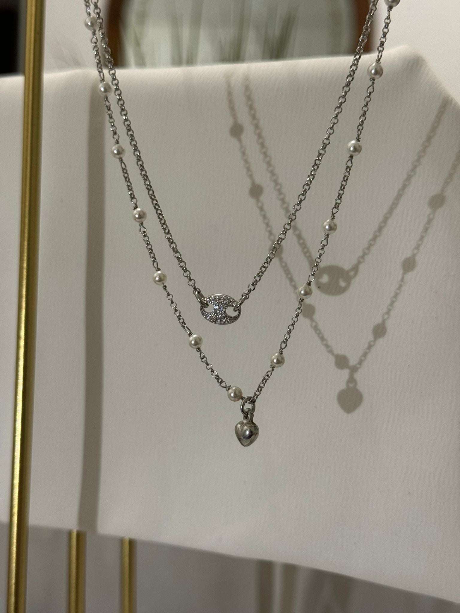 Collana con ciondolo cuore e perle