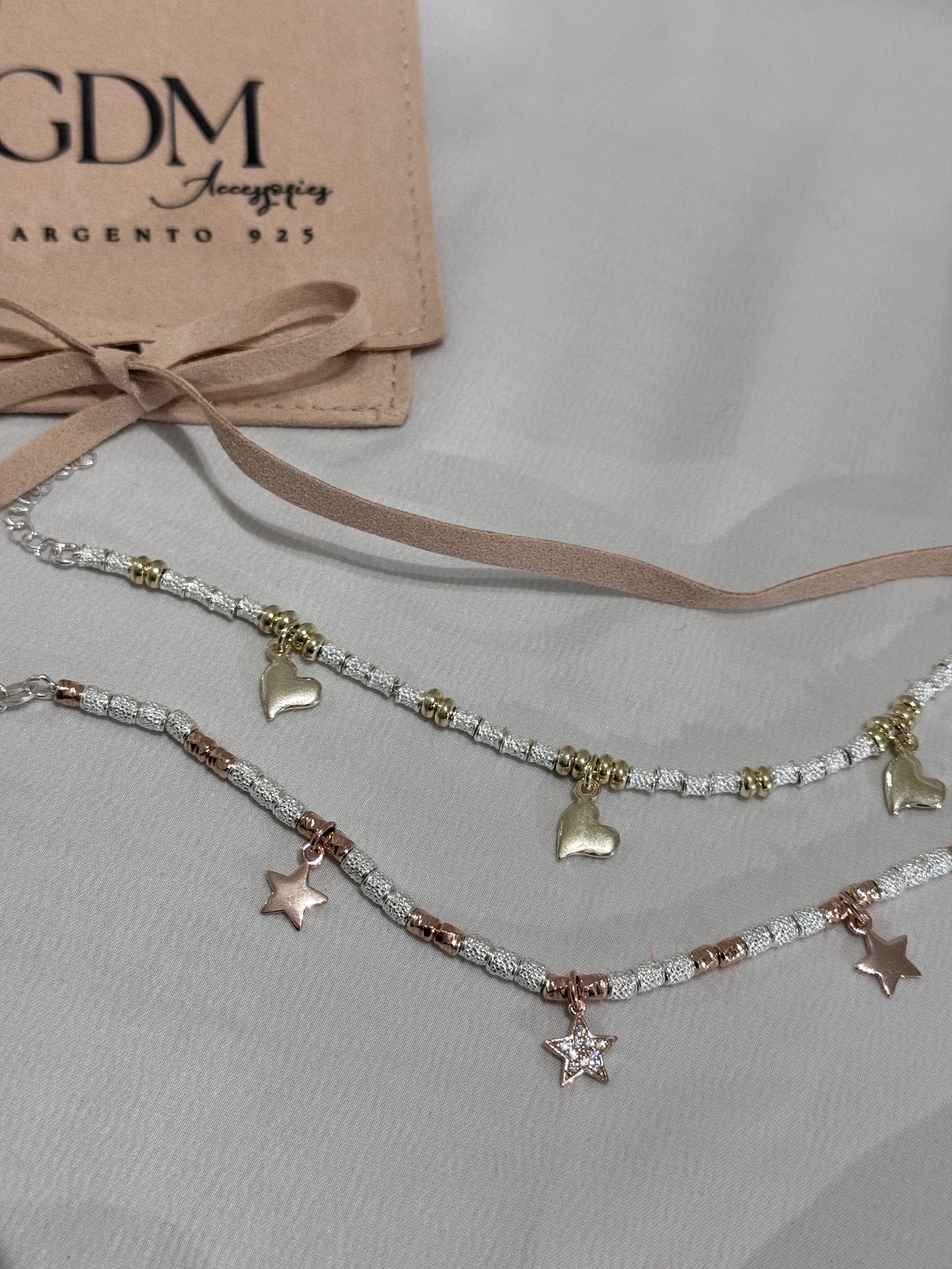 Bracciale granelli e charms