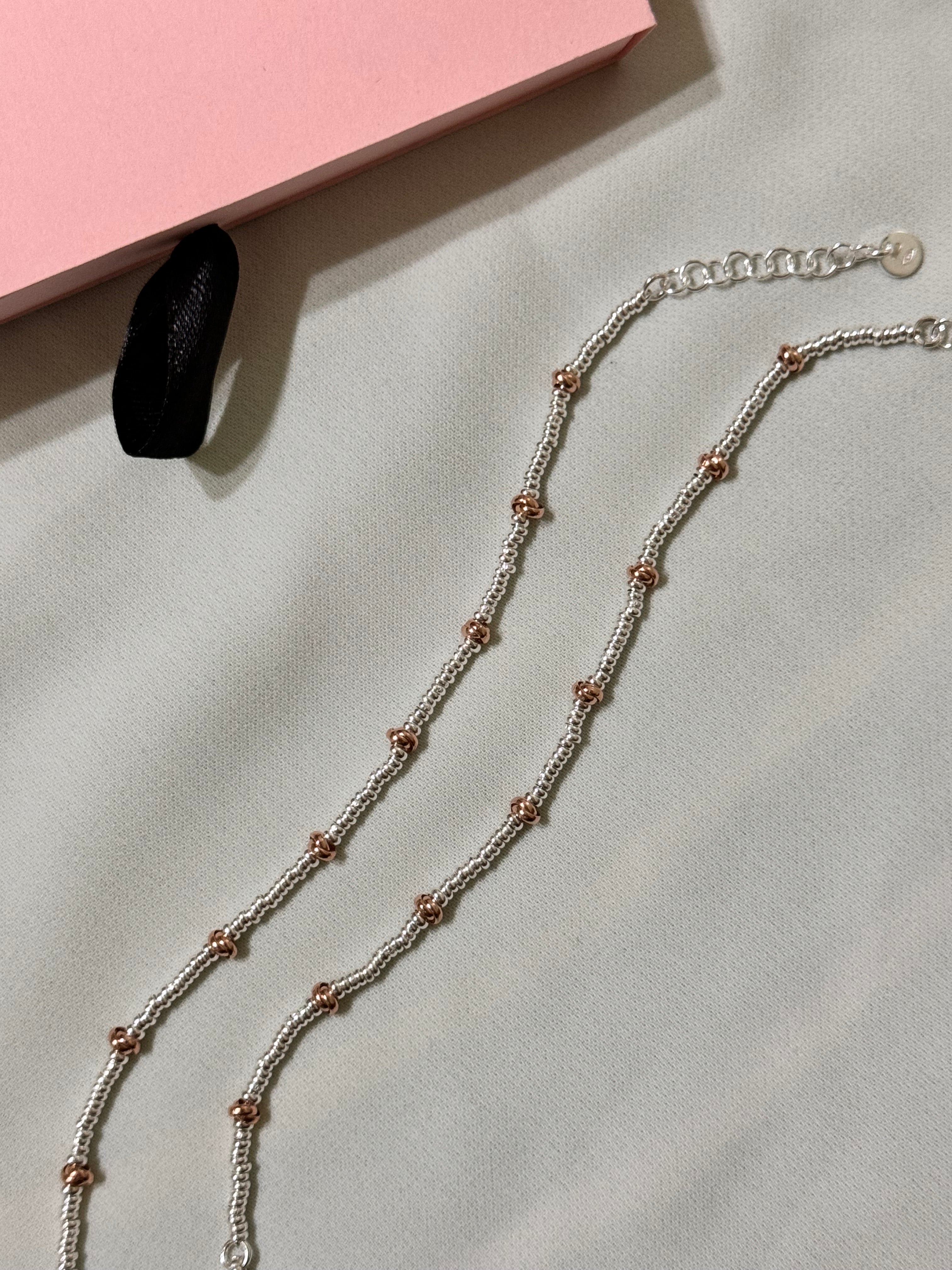 Bracciale Rondelline e Nodini Rosa