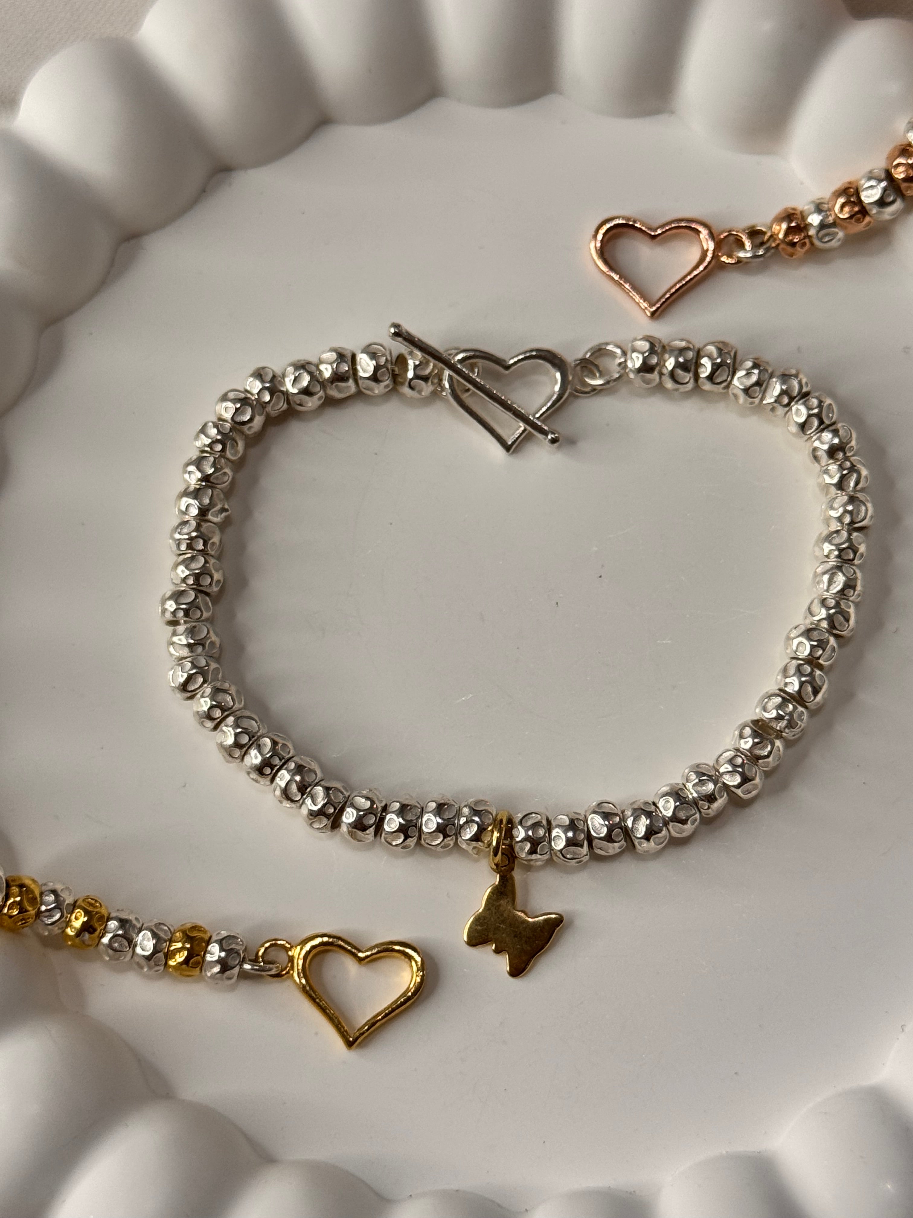 Bracciale Granelli Bombati e Tondeggianti con Nodini