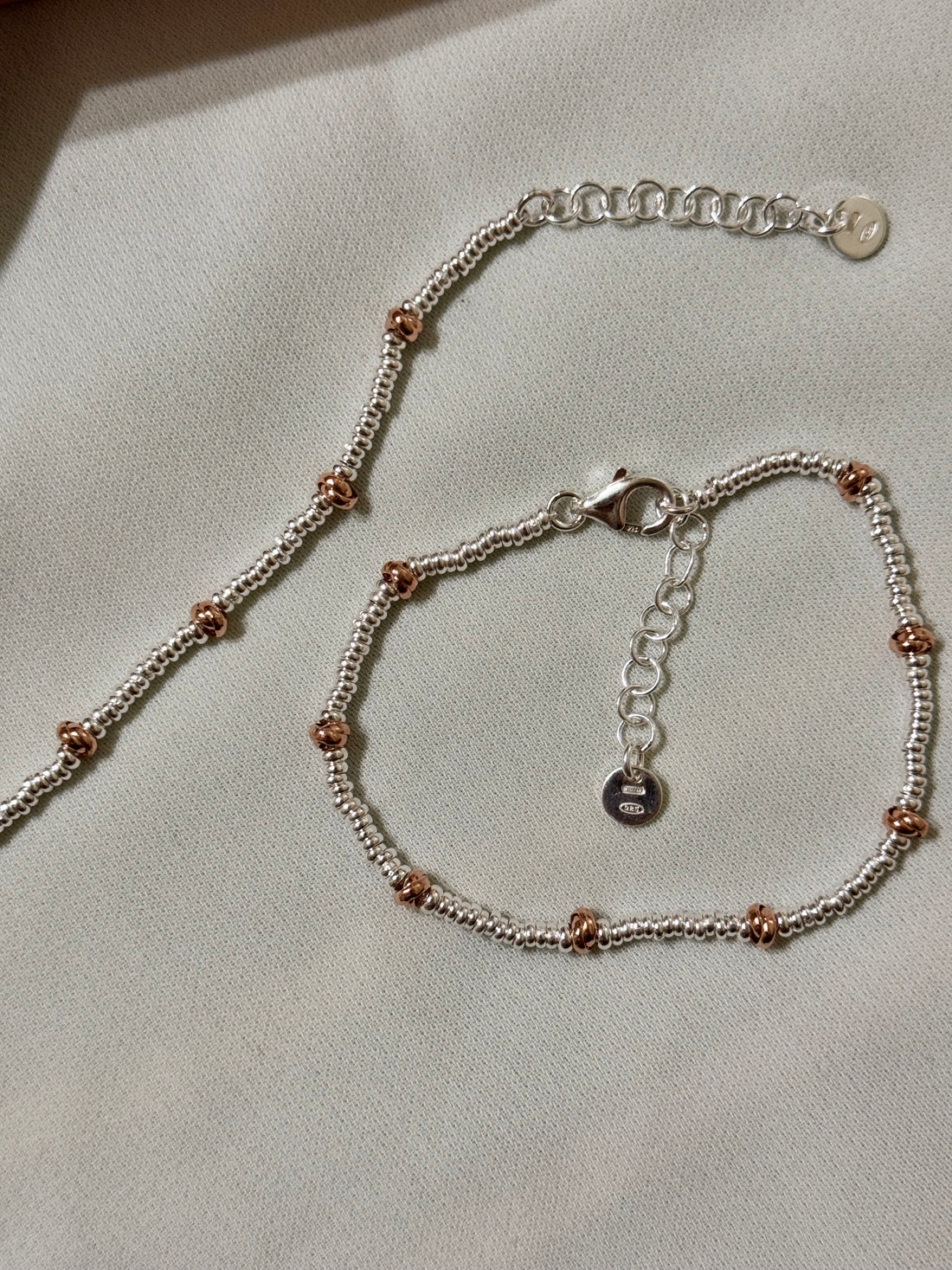 Bracciale Rondelline e Nodini Rosa