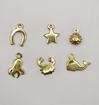 Collana Granelli Bombati Argento e Oro e Charms