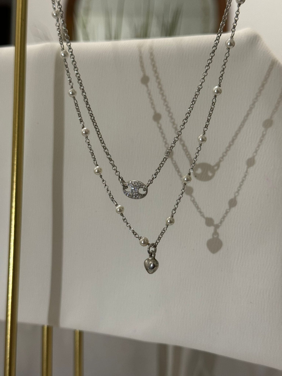 Collana con ciondolo cuore e perle