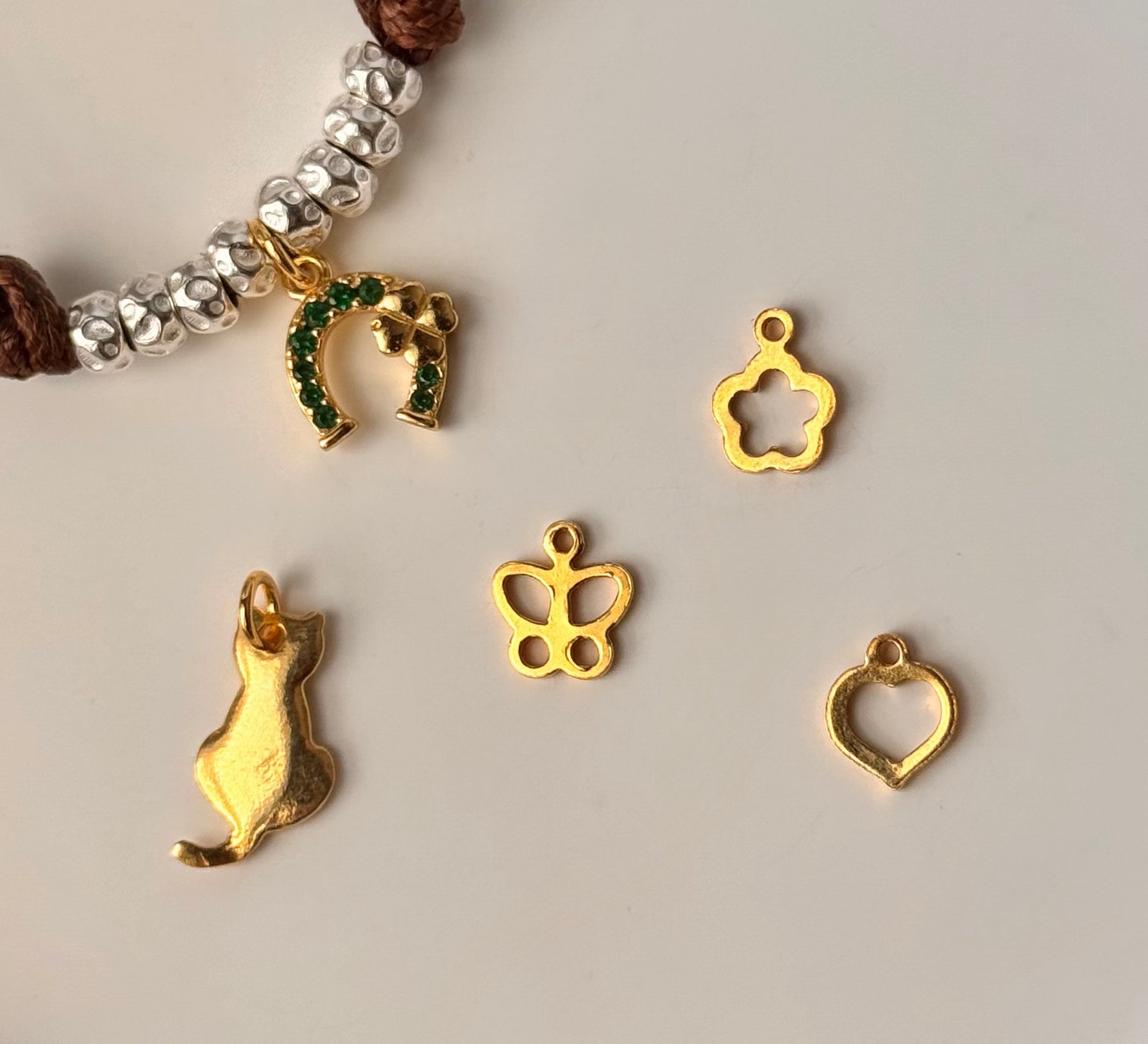 CREA IL TUO BRACCIALE GRANELLI BOMBATI E TONDEGGIANTI - Argento e Oro