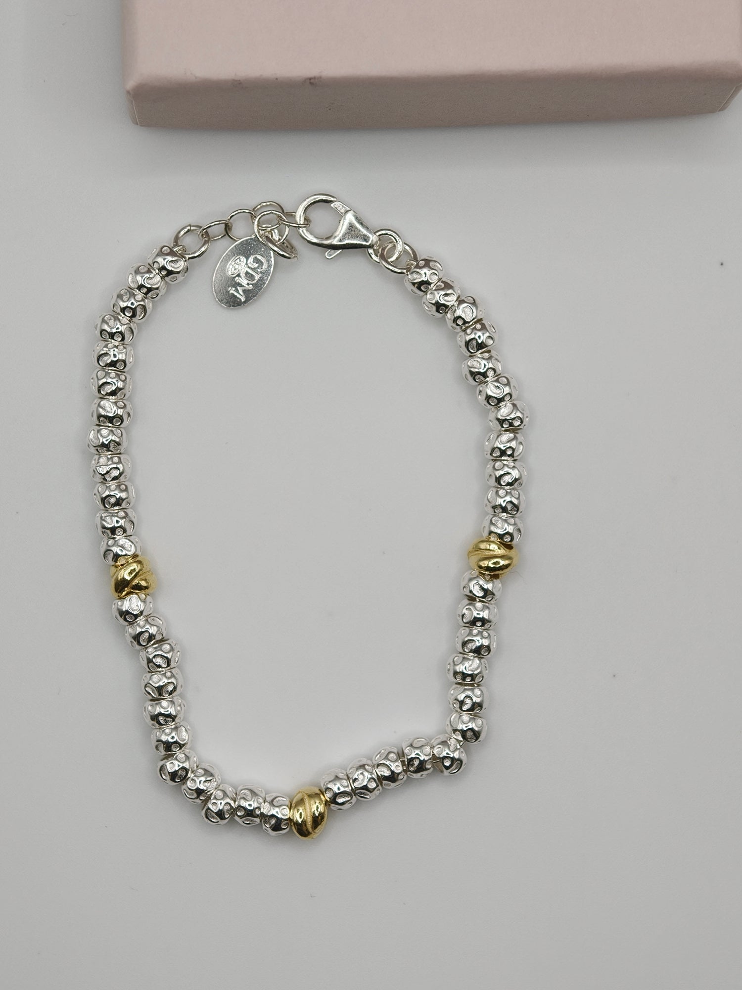 Bracciale Granelli Bombati e Tondeggianti con Nodini