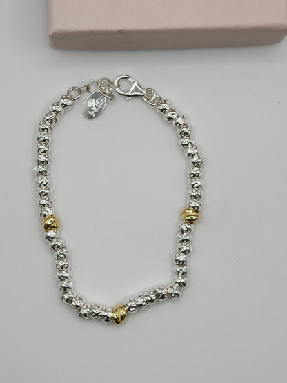 Bracciale Granelli Bombati e Tondeggianti con Nodini